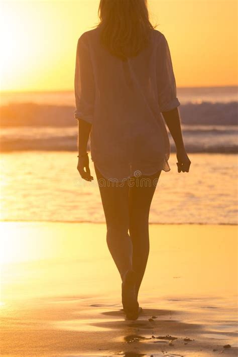 Lady Walking On Sandy Beach In Sunset Stock Image Image Of