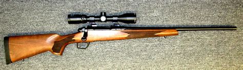 Preowned Remington 783 Bolt Action Rifle 308 Win 22″ Blued Barrel Walnut Stock Bushnell