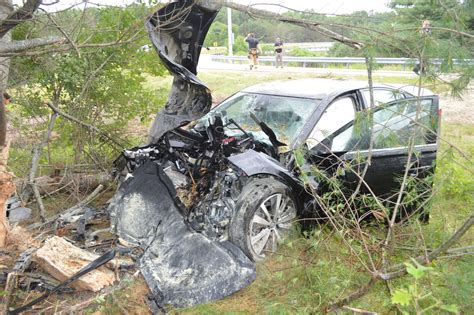 Car Crashes Into Trees Catches Fire While Exiting I 295 In Brunswick