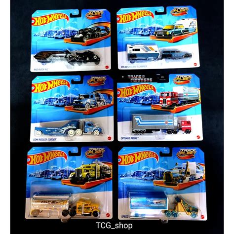 Hot Wheels Track Fleet 2024 Optimus Prime Volvo Rad Rider Semi Rodger Fuel Fire Speed