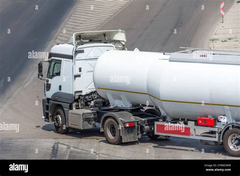 Truck With Fuel Tank Turns Onto The Expressway Onto The Route In Gas