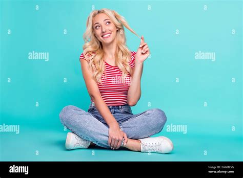 Photo Of Dreamy Adorable Young Woman Dressed Red T Shirt Smiling