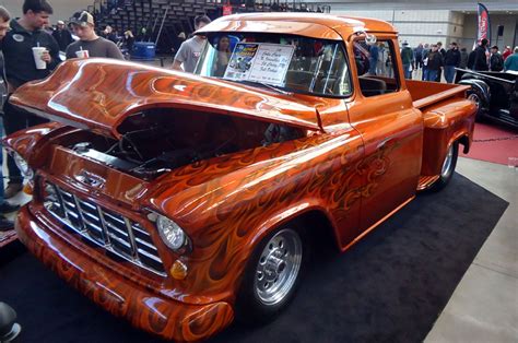 Classic Orange Chevy Truck With Flames