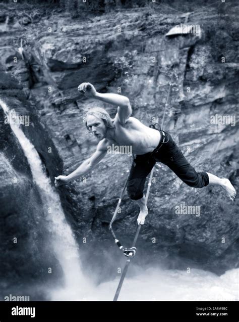 Tightrope Walker Balancing On A Thin Line Stock Photo Alamy