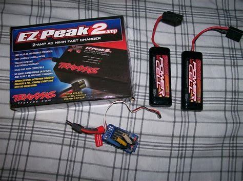 Traxxas Stuff - VXL 3m ESC, EZ Peak 2amp Charger, 2 NIMH 1/16 Batteries ...