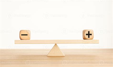 Plus And Minus Balance Concept Positive And Negative Symbols On Wooden