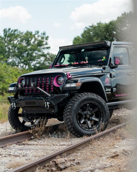 Black Jeep Wrangler With Pink Rims