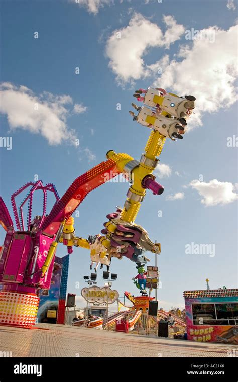 Rotating fun scary fairground ride Stock Photo - Alamy