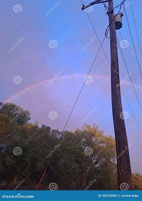 Double Rainbow with Storm Clouds Still Hanging Around. Stock Image ...