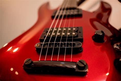 Premium Photo Electric Guitar Red Color In The Music Shop