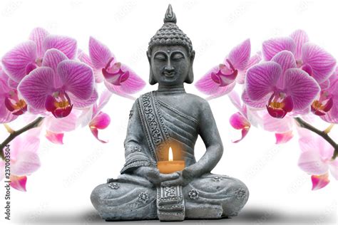 Buddhastatue Mit Kerze Und Orchideen Stock Photo Adobe Stock