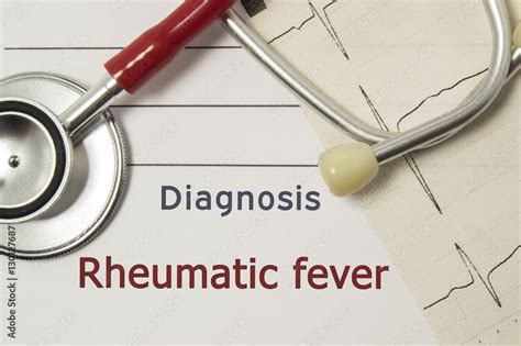 Cardiac Diagnosis Of Rheumatic Fever On Doctor Workplace Are Red Stethoscope Printed On Paper