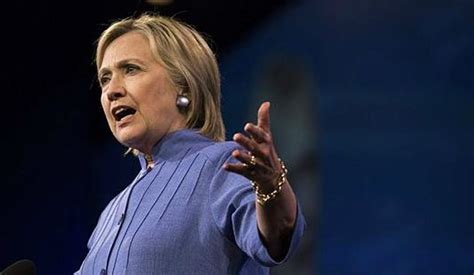 In Appeal To Wavering Republicans Clinton Touts American