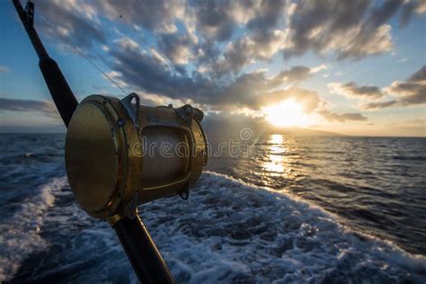 Deep Sea Fishing Reel On A Boat During Sunrise Stock Image Image Of