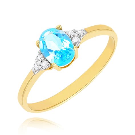 Złoty pierścionek 585 topaz 1 05 ct diamenty 0 065 ct Cena Sklep