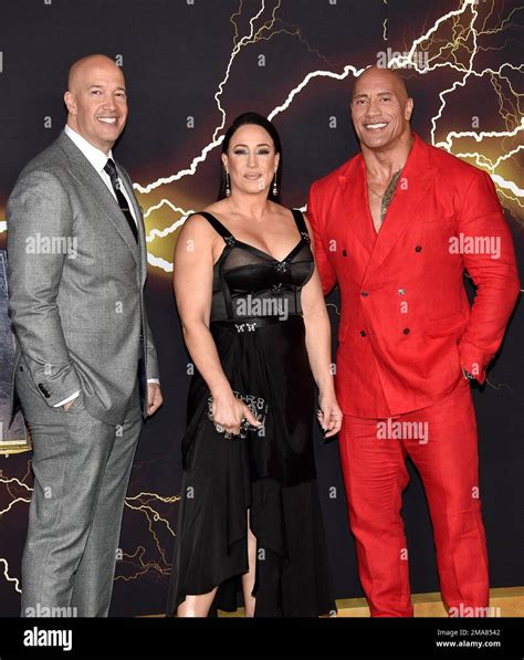 Producers Hiram Garcia Left And Dany Garcia Pose With Dwayne Johnson