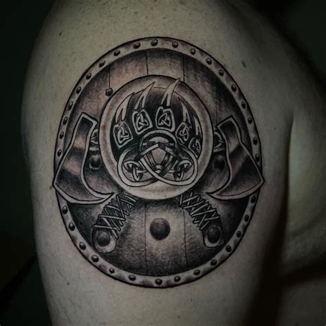 Symbol Of Strength And Courage Tattoo