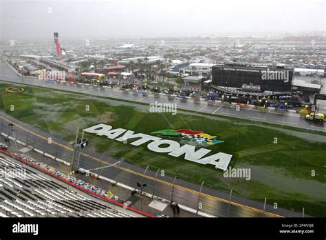 Rain Falls And Causes The Front Stretch Infield To Flood During The