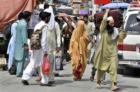 People With Their Luggage Arrives At Faizabad Bus Stand To Leave For