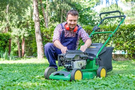 Man Portrait Mowing The Lawn With Lawnmower Stock Image Image Of