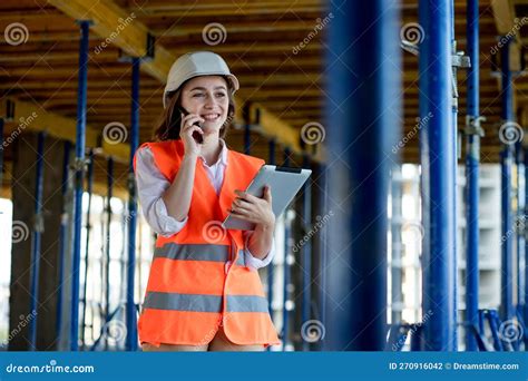 Female Construction Engineer Architect With A Tablet Computer At A