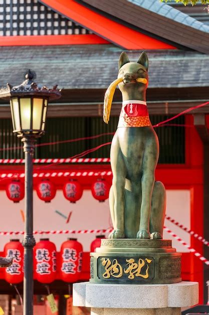 Premium Photo Kyoto Japan Fox Statue With Japanese Traditional Red