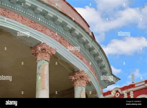 009 Rounded Corner Porch In Light Salmon And Mint Green Eclectic Style