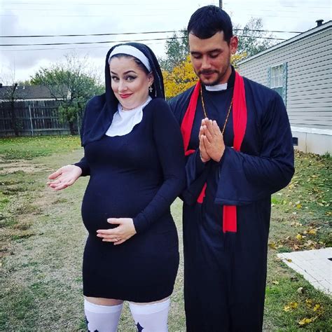 A Man And Woman Dressed Up As Nun And Nunette Standing Next To Each Other