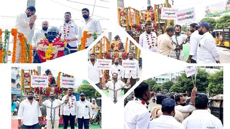 Save Democracy Protest At Gandhiji Statue With Hand Cuffs By Ravipati