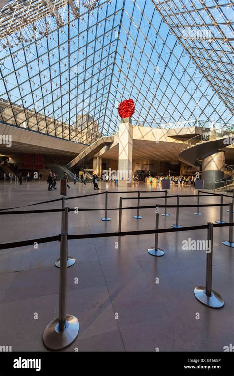 Louvre inside pyramid hi-res stock photography and images - Alamy