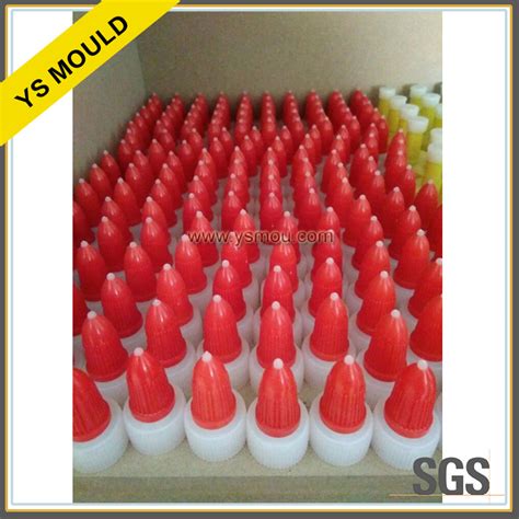 Multi Cavity Plastic Injection Glue Bottle Cap And Plug Mold China