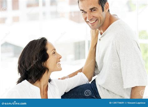 Couple In Love Moment Of Intimacy Between Middle Aged Man And Woman Stock Image Image Of