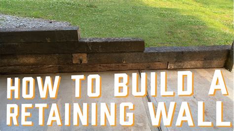 Installing A Retaining Wall With Railroad Ties Wall Design Ideas