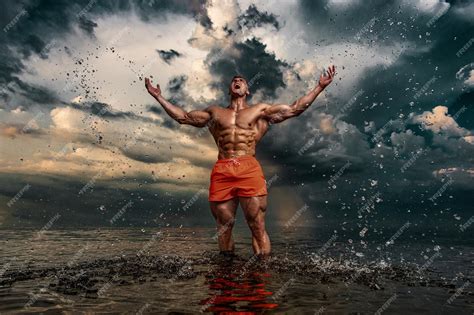 Premium Photo Fit Athlete Bodybuilder On The Beach Attractive Young