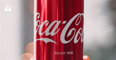 Person Holding Coca Cola Can Photo Free Coke Image On Unsplash