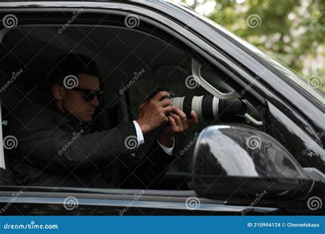 Private Detective With Camera Spying From Car Stock Photo Image Of