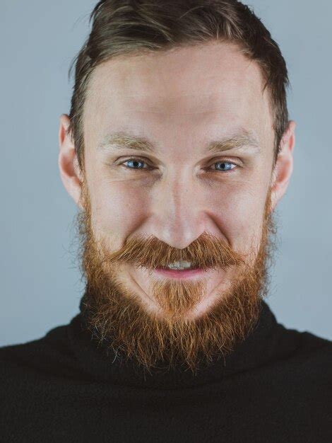 Premium Photo Portrait Of Smiling Handsome Bearded Man Confident