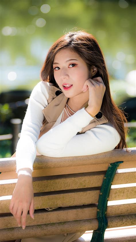 Photos Bokeh Pose Female Asian Bench Hands Staring 1080x1920