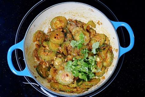 Bitter Gourd Curry | Karela Sabzi Recipe - Swasthi's Recipes