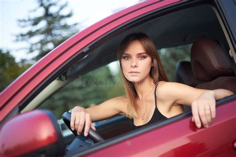 Beautiful Serious Girl Sit In A Car At Twilight Stock Image Image Of