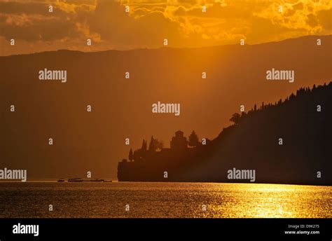 Lake Ohrid at sunset with silhouette of St Jovan Kaneo church, Ohrid ...