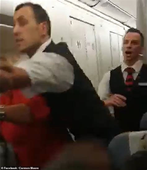 Shocking Moment Aggressive Passenger Hits A Female Flight Attendant In