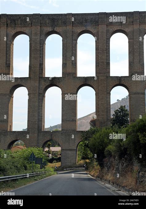 Big Arches Of An Ancient Aqueduct Called Carolino Near Caserta City In