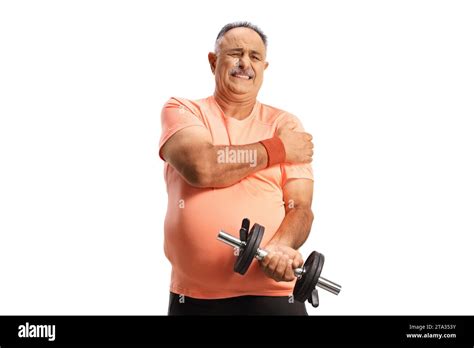 Mature Man In Pain Holding A Dumbbell Isolated On White Background