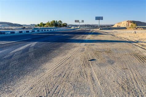 Premium Photo Asphalt Road In Arabian Desert Not Far From The