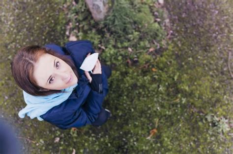 Premium Photo High Angle Portrait Of Woman Standing On Grass