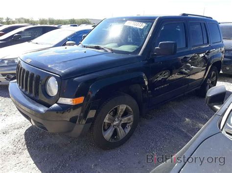 Report 1c4njpbb3gd700060 Jeep Patriot 2016 Black Gas Price And Damage