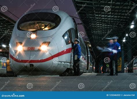 Railway Staff Preparing The Departure Of A German High Speed Train Ice
