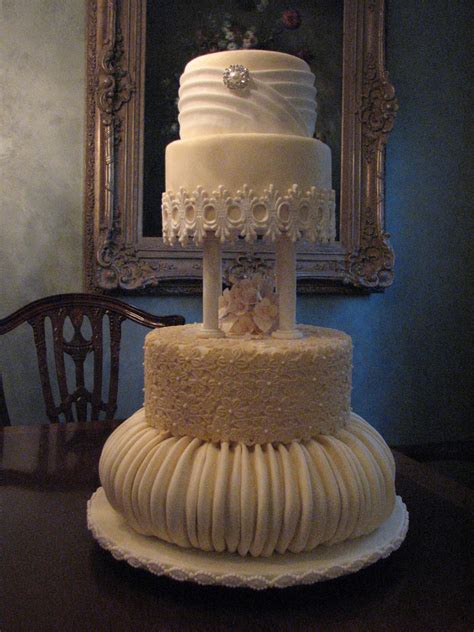 4 Tier Victorian Influence Wedding Cake In Ivory With Ruching And Lace