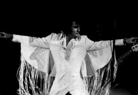 Elvis On Stage In The Long Fringe Jumpsuit In 1970 Elvis In Concert Elvis Elvis Jumpsuits